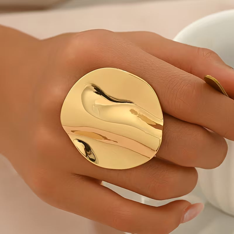 A Stylish Ring With A Shiny Golden Surface