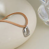 Brown Velvet Cord Necklace with Irregular Silver Pendant