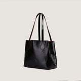 Women’s Black Leather Bag with Rich Red Interior