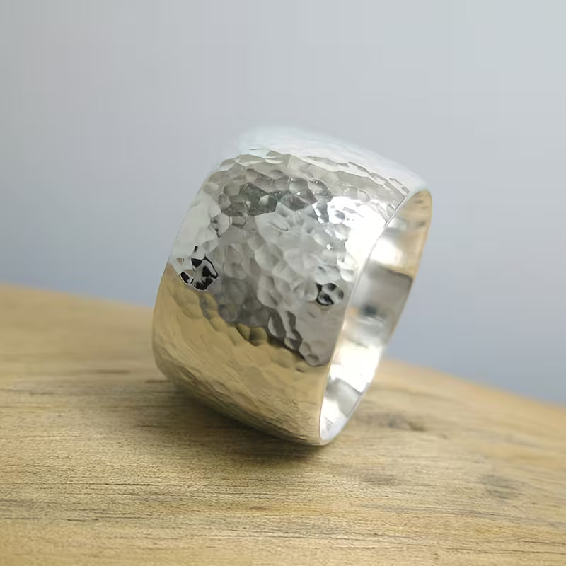 Wave-Patterned Ring with a Textured Surface