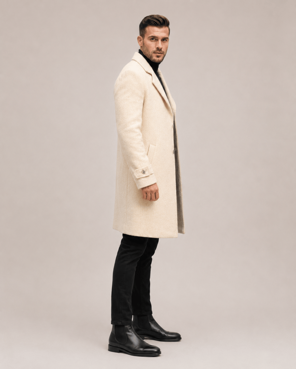 Luxury men's organic wool overcoat featuring traditional Chitrali craftsmanship and modern tailoring