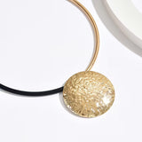 Hammered Disc Pendant Necklace –